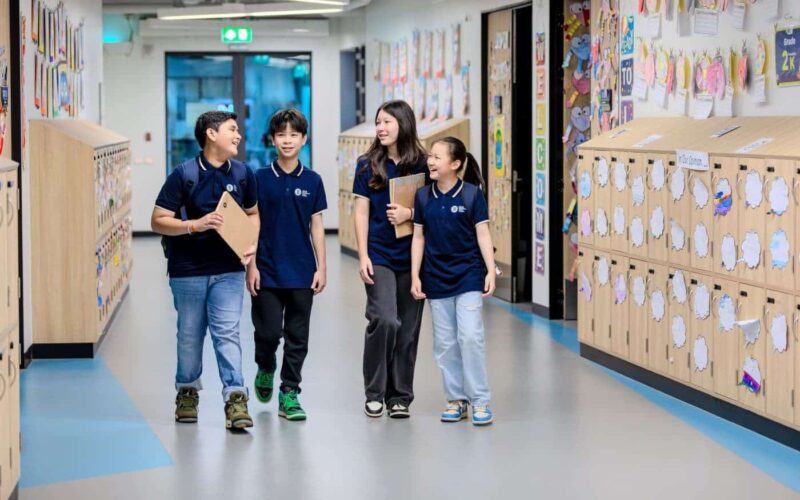 A teacher instructing a class at BASIS International School Bangkok