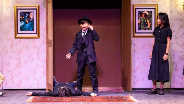 A BASIS International School Bangkok student performing on stage in the Black Box Theatre