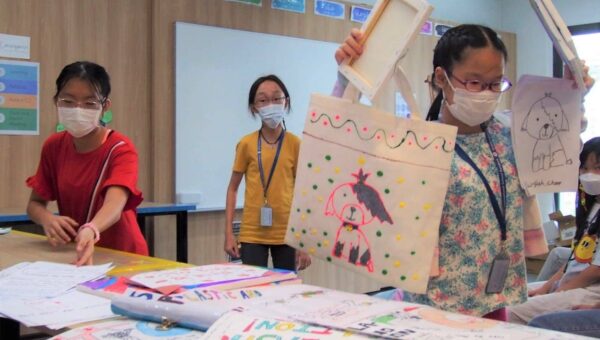 Young BASIS International School Bangkok students making art in class